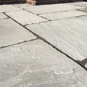 Kandla Grey Aged and Tumble Sandstone Patio Slabs Mixed Sizes Close Up
