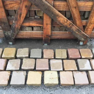 Raj Green Tumbled Cobbles laid on the floor in brick bond pattern